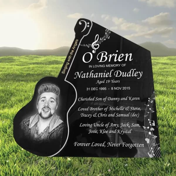 O’Brien headstone in laser etched black granite with portrait